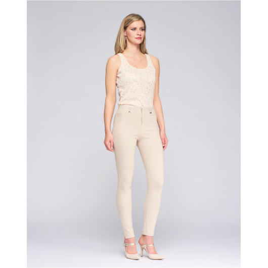 Pantalon leggins beige avec coton mélangé, zip sur devant