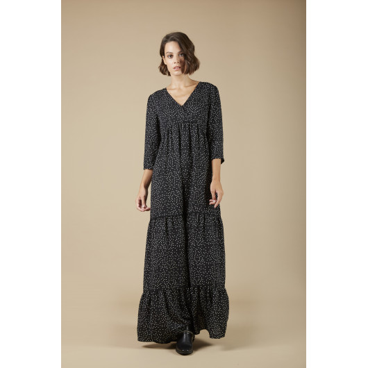Langes Adeline-Kleid kleine pünkte auf schwarzem Hintergrund