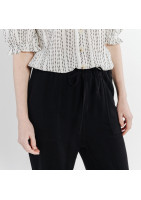 Black supple linen trousers, with 4 applied pockets, elasticated waist.