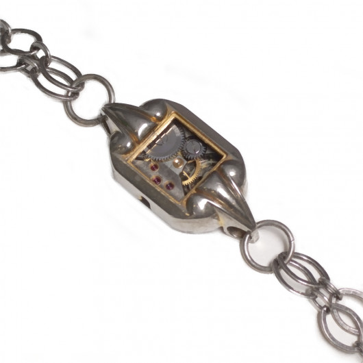 Bracelet chaîne Art Déco garni d'un ancien mouvement de montre suisse