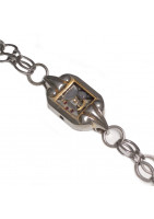 Bracelet chaîne art deco garni d'un ancien mouvement de montre suisse