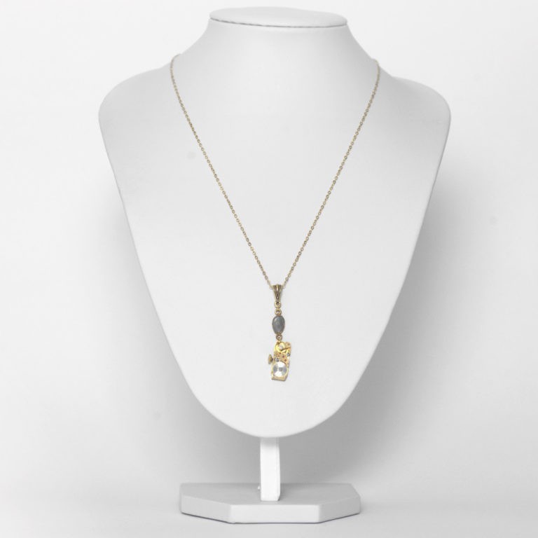 Necklace with vintage Baume & Mercier 20 Swiss watch movement, with ruby and labradorite