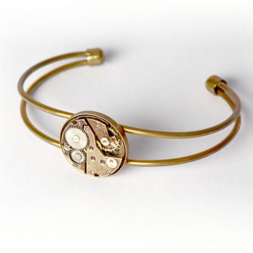 Bronze bracelet with genuine old swiss watch movement with ruby