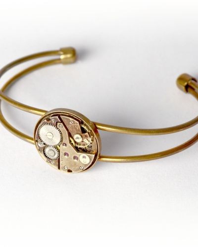 Bracelet bronze avec véritable ancien mouvement de montre suisse avec rubis