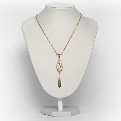 Necklace with antique Swiss watch movement