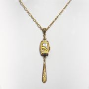 Necklace with antique Swiss watch movement