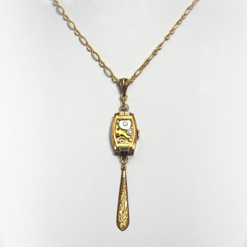 Necklace with antique Swiss watch movement