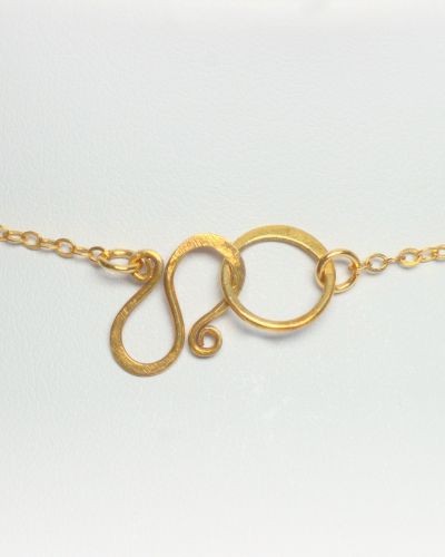 Halskette mit Schweizer altes Uhrwerk Baume & Mercier 20er mit Rubin und Labradorit
