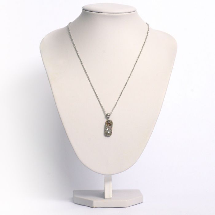 Necklace with an antique watch movement from the Swiss brand Baume & Mercier®