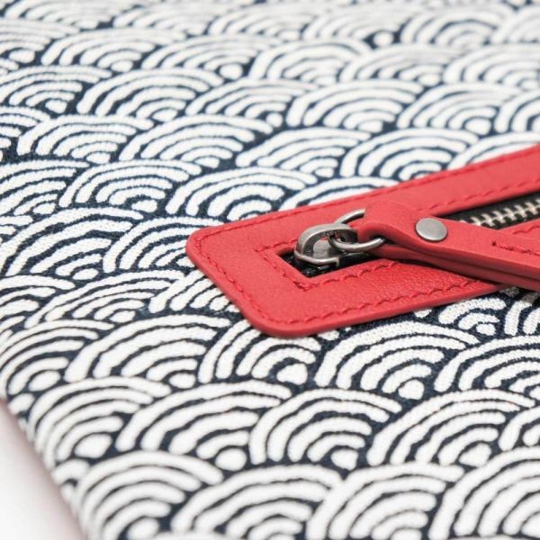 MIU foldable clutch bag, in fine leather and Japanese-inspired fabric