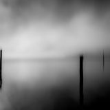 Nebelwellen am See