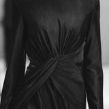 Elegant model in a black dress.