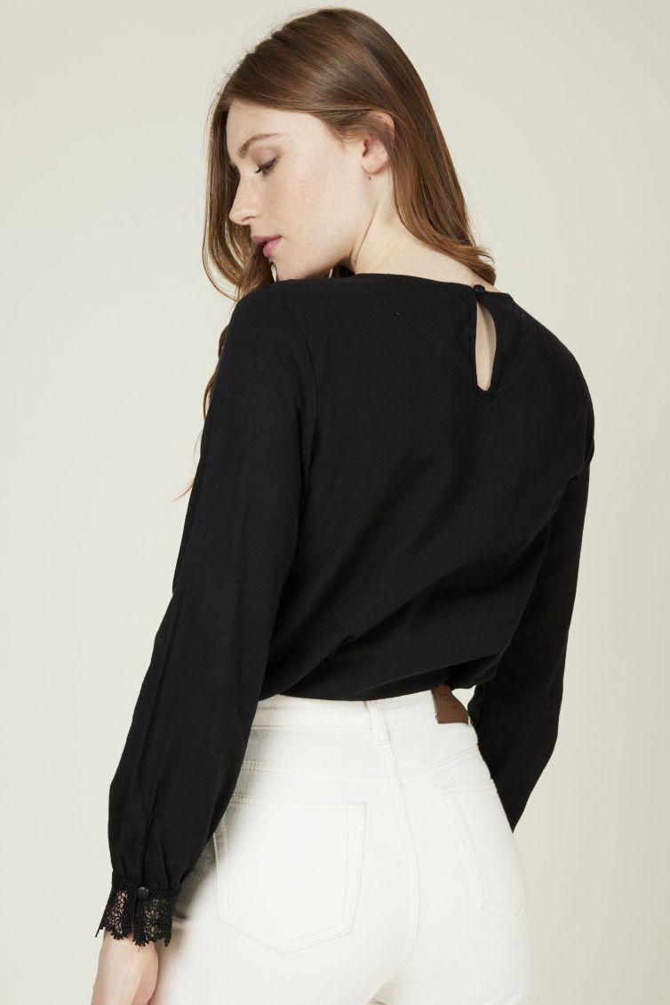 Black cotton blouse with lace ribbon on neckline and cuffs