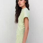 Pastel mint draped maxi dress with high V-back neckline and elegant slit
