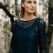 Long evening dress in navy lace and low back neckline