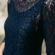 Long evening dress in navy lace and low back neckline